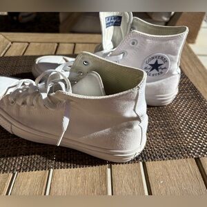 Converse shoes.  Worn Once Men’s 8.5 Womens 10.5. White classics